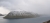 Остров Калсой в северной части Атлантического океана, основные жилые дома и гавани находятся в правой стороне в тумане
