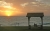 Заход солнца на берегу Индийского океана в городском пляже Перта, Западная Австралия